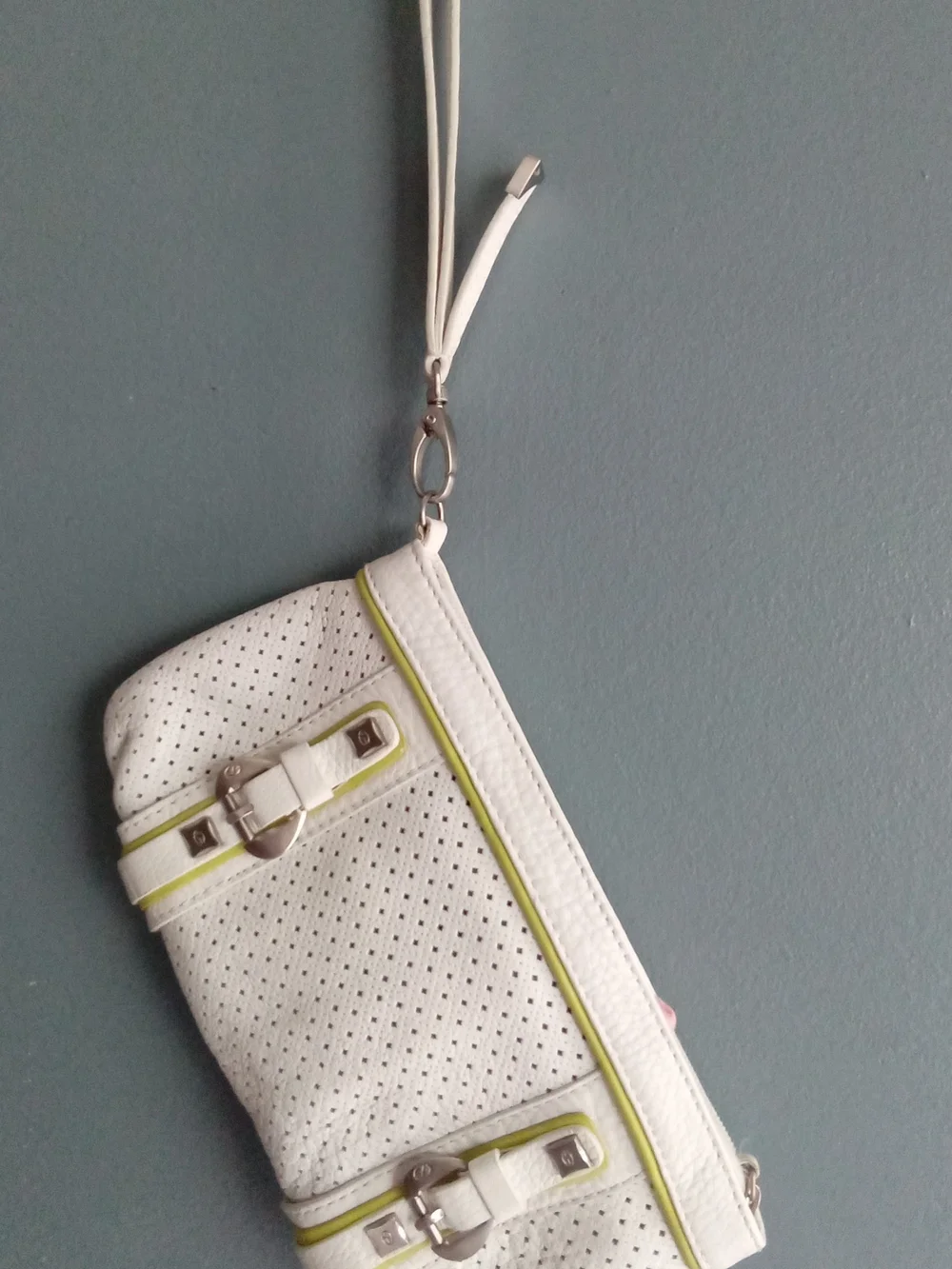 White Perforated Faux Leather Wristlet Clutch with Lime Green Trim and Buckles